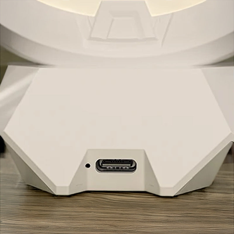 Close-up of the HALO WORLD with a USB-C port on a wooden desk.